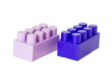 details of a children's plastic constructor on a white background. colored cubes. block.