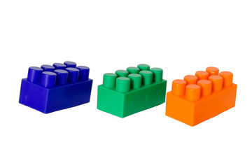 details of a children's plastic constructor on a white background. colored cubes. block.