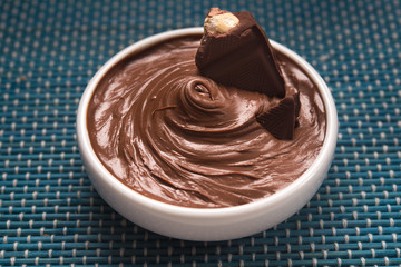Bowl with tasty melted chocolate
