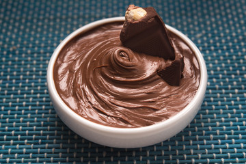 Bowl with tasty melted chocolate