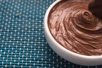 Bowl with tasty melted chocolate
