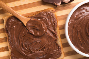 Sweet chocolate spread on bread