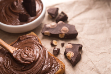 Sweet chocolate spread on bread
