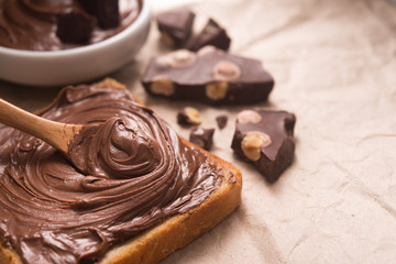 Sweet chocolate spread on bread