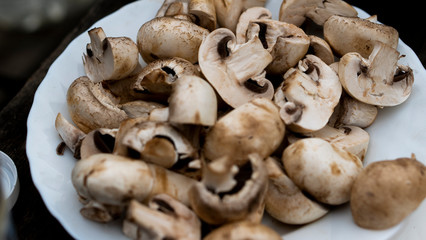 fresh mushrooms on wooden background
