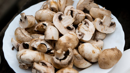 fresh mushrooms on wooden background