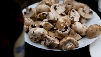 fresh mushrooms on wooden table