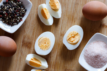 Hard boiled egg on wooden background