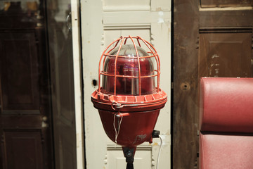 old red lantern boat sea equipment.