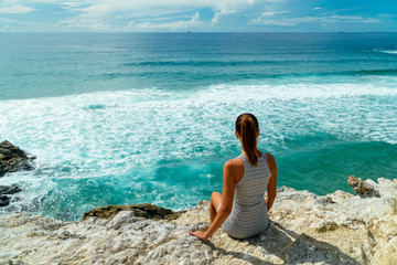 Young Woman Admiring Beautiful Landscape Of Cliffs And Ocean In Algarve, Portugal
