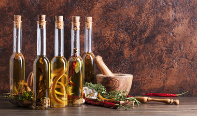 Olive oil with different spices and herbs.