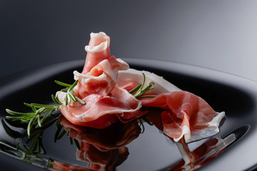 Prosciutto with rosemary.