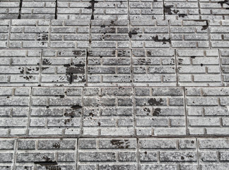 Pavement. Sidewalk tiles background. Pavement tiles. Top view. Closeup. Footpath. Concrete. Stairs
