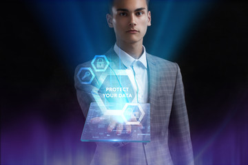 The concept of business, technology, the Internet and the network. A young entrepreneur working on...