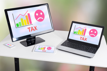 Tax increase concept on different devices