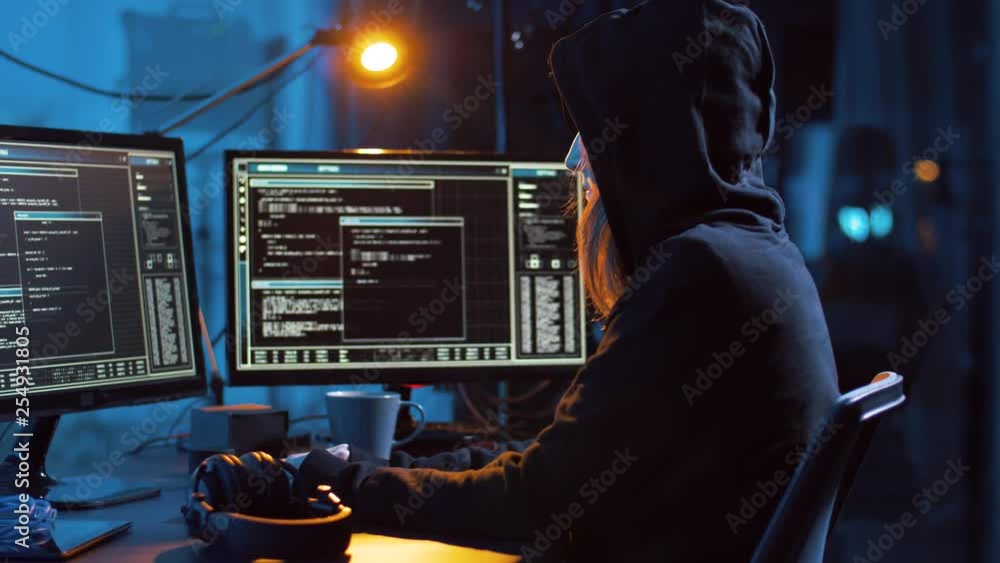 Poster cybercrime, hacking and technology concept - female hacker in dark room creating code or using compu