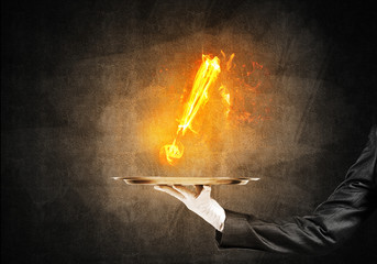 Waitress's hand keeping flaming exclamation mark