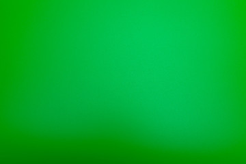 Texture in a bright, green color illuminated with a delicate light.