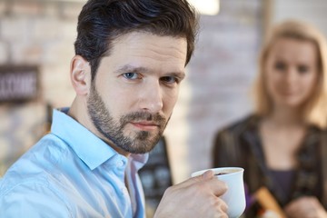 Man drinking coffee