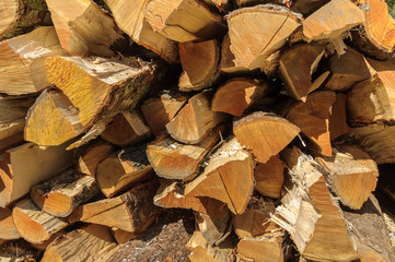 Fullframe close up of a pile of chopped wood logs