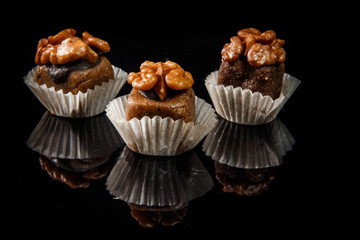 three healthy useful organic handmade candies with walnuts