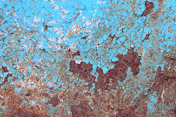 Peeling paint on wall seamless texture. Pattern of rustic blue grunge material