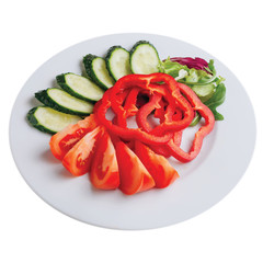 vegetables on a plate isolated on white