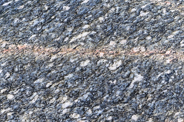 Sea stone texture. Panel texture. Spots gray red background. Background fill. Natural stone background.