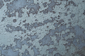 Part of a retro wall made with cracked paint. architecture, construction.