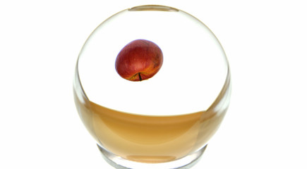 organic fresh red apple with lens ball
