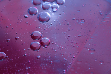 Abstract backgrounds and wallpapers. Colored water mixed with oil.