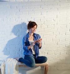 Young woman using mobile