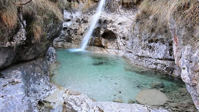 waterfalls in the mountains of clear and transparent water