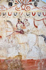 ancient frescoes in the tomb in the necropolis of Paestum