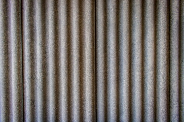 Textured and background of the old pattern of the roofing tiles in the rural or the countryside of Thailand