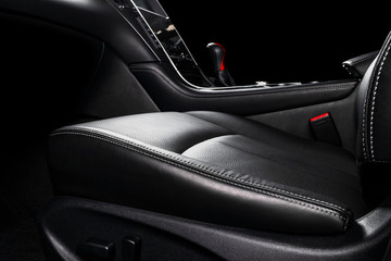 Modern Luxury car inside. Interior of prestige modern car. Comfortable leather seats. Black...
