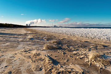 cooling towers emit steam at a nuclear power plant located on the shore of the Bay.Cooling of...