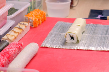 Cooks rolls with cream cheese on top. Making rolls process