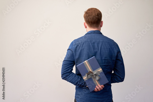 Man hiding present