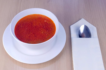 Prawn soup with mushrooms,Tom Yam Kung, thai food on wooden table, side view