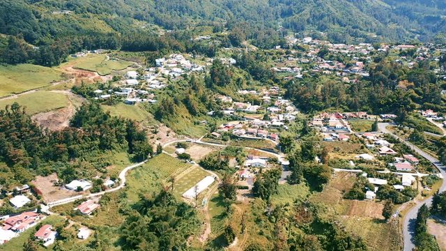 Aerial view over the town of Hell-Bourg, a community in the Cirque de Salazie region of Reunion Island