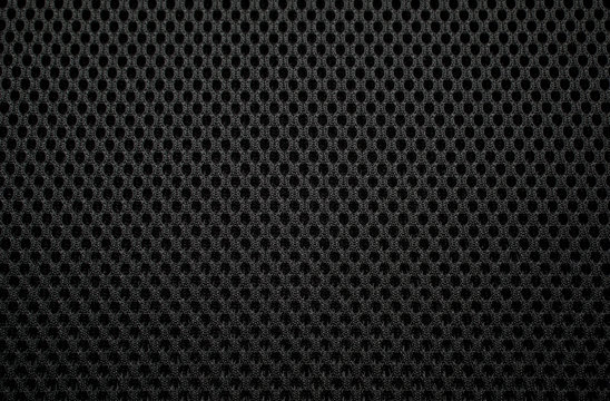 Closeup the mesh fabric pattern of the backrest of the chair 