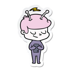 sticker of a friendly cartoon spaceman