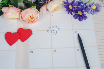 Word Wedding to Reminder Wedding day in calendar planning and pen with heart.