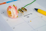 Word Wedding to Reminder Wedding day with Wedding ring on calendar planning and office tool.