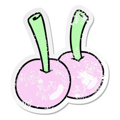 distressed sticker of a quirky hand drawn cartoon cherries