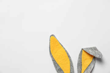 Funny Easter bunny ears on white background, top view