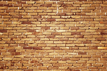Stone wall texture background of grey brick stones.