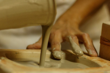 Hands of potter making