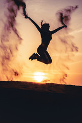 woman like a litte girl playing on the sun of dubai